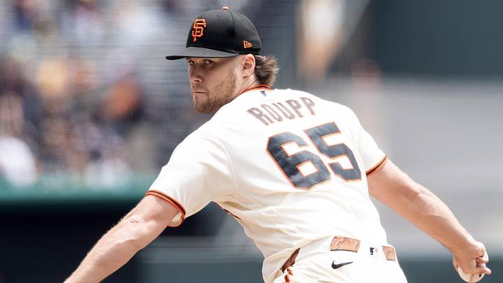 San Francisco Giants starting pitcher Landen Roupp (65) delivers a pitch against the Athletics. 