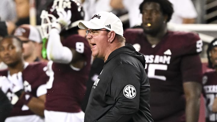 Nov 16, 2024; College Station, Texas, USA; Texas A&M Aggies head coach Mike Elko reacts during the first half against the New Mexico State Aggies at Kyle Field. Mandatory Credit: Maria Lysaker-Imagn Images 