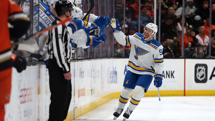 Mar 8, 2026; Anaheim, California, USA;  St. Louis Blues left wing Jonathan Drouin (92) celebrates with teammates after scoring a goal during the second period against the Anaheim Ducks at Honda Center. Mandatory Credit: Kiyoshi Mio-Imagn Images