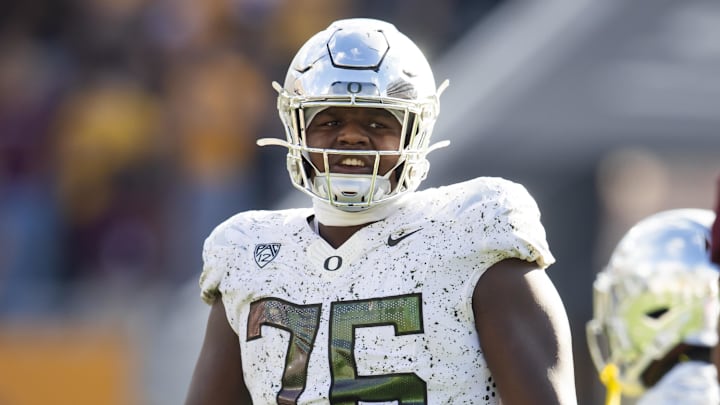 Nov 18, 2023; Tempe, Arizona, USA; Oregon Ducks offensive lineman Josh Conerly Jr. (76) against the Arizona State Sun Devils at Mountain America Stadium. Mandatory Credit: Mark J. Rebilas-Imagn Images
