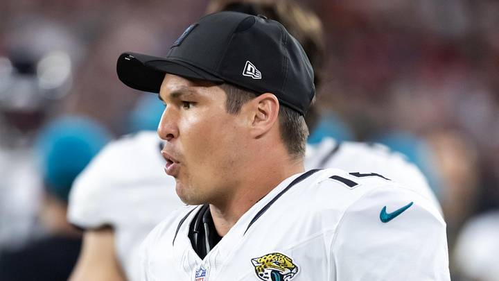 Nov 23, 2025; Glendale, Arizona, USA; Jacksonville Jaguars quarterback Nick Mullens (14) against the Arizona Cardinals at State Farm Stadium. Mandatory Credit: Mark J. Rebilas-Imagn Images