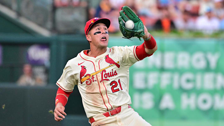 Sep 6, 2025; St. Louis, Missouri, USA; St. Louis Cardinals outfielder Lars Nootbaar (21) makes the catch on a fly ball to left field by San Francisco Giants catcher Patrick Bailey (14) in the second inning at Busch Stadium. Mandatory Credit: Tim Vizer-Imagn Images