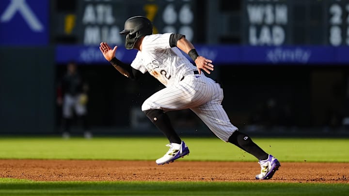 Colorado Rockies right fielder Tyler Freeman (2) runs the bases at Coors Field.