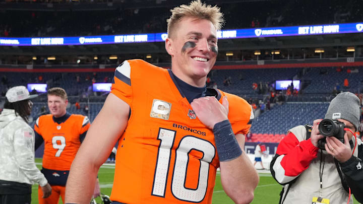 Nov 17, 2024; Denver, Colorado, USA; Denver Broncos quarterback Bo Nix (10) reacts following the win over the Atlanta Falcons at Empower Field at Mile High. Nov 17, 2024; Denver, Colorado, USA; Denver Broncos quarterback Bo Nix (10) reacts following the win over the Atlanta Falcons at Empower Field at Mile High.