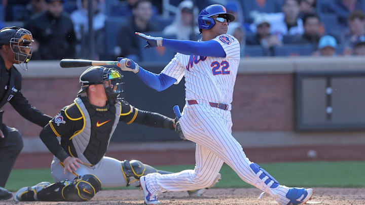 Mar 29, 2026; New York City, New York, USA; New York Mets left fielder Juan Soto (22) follows through on an RBI double against the Pittsburgh Pirates during the tenth inning at Citi Field. Mandatory Credit: Brad Penner-Imagn Images