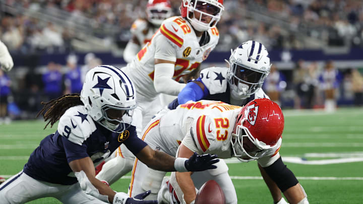 Nov 27, 2025; Arlington, Texas, USA; Dallas Cowboys wide receiver KaVontae Turpin (9) and Kansas City Chiefs linebacker Drue Tranquill (23) look to recover a fumble during the fourth quarter at AT&T Stadium. Mandatory Credit: Kevin Jairaj-Imagn Images