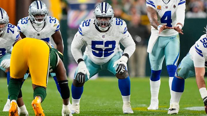 Dallas Cowboys guard Tyler Booker (52) during the game against the Green Bay Packers at Lambeau Field. Mandatory Credit: Jeff Hanisch-Imagn Images