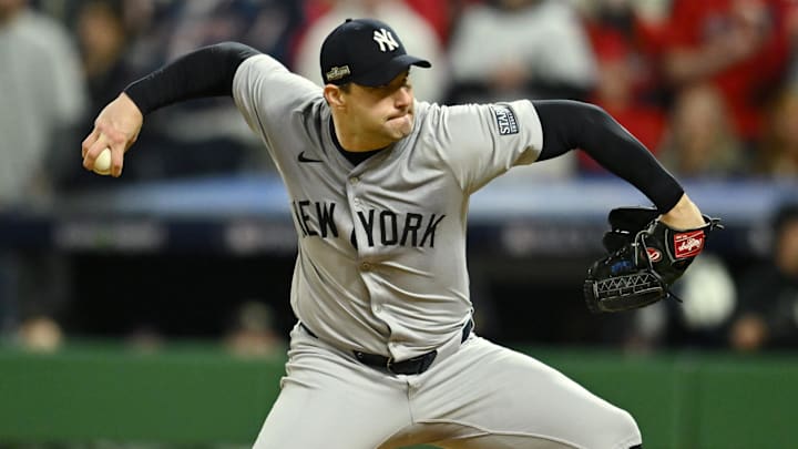 Oct 18, 2024; Cleveland, Ohio, USA; New York Yankees pitcher Tommy Kahnle (41) pitches in the ninth inning against the Cleveland Guardians during game four of the ALCS for the 2024 MLB playoffs at Progressive Field. Oct 18, 2024; Cleveland, Ohio, USA; New York Yankees pitcher Tommy Kahnle (41) pitches in the ninth inning against the Cleveland Guardians during game four of the ALCS for the 2024 MLB playoffs at Progressive Field.