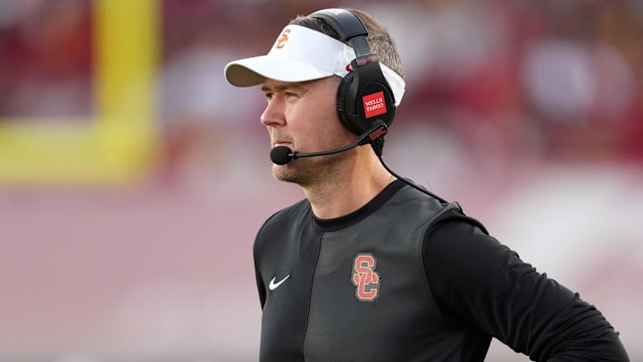 Aug 30, 2025; Los Angeles, California, USA; Southern California Trojans head coach Lincoln Riley watches from the sidelines against the Missouri State Bears in the first half at United Airlines Field at Los Angeles Memorial Coliseum. Mandatory Credit: Kirby Lee-Imagn Images