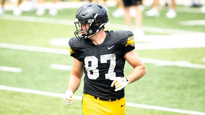 Aug 9, 2025; Iowa tight end Addison Ostrenga (87) lines up during the Hawkeyes Kids Day NCAA football open practice at Kinnick Stadium in Iowa City, Iowa. Mandatory Credit: Joseph Cress for the Des Moines Register