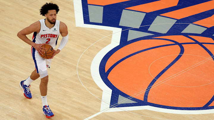 Detroit Pistons guard Cunningham brings the ball up court against the New York Knicks at Madison Square Garden. 