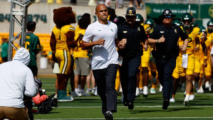 Sep 19, 2026; Waco, Texas, USA; Baylor Bears head coach Dave Aranda runs onto the field with his team before the game against the Louisiana Tech Bulldogs at McLane Stadium. Mandatory Credit: Chris Jones-Imagn Images Sep 19, 2026; Waco, Texas, USA; Baylor Bears head coach Dave Aranda runs onto the field with his team before the game against the Louisiana Tech Bulldogs at McLane Stadium. Mandatory Credit: Chris Jones-Imagn Images