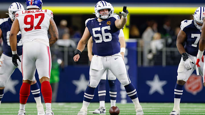 Dallas Cowboys center Cooper Beebe signals at the line against the New York Giants. Dallas Cowboys center Cooper Beebe signals at the line against the New York Giants.