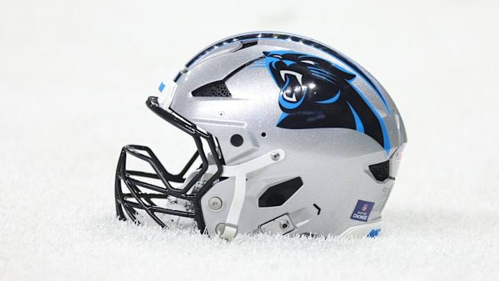 Dec 14, 2025; New Orleans, Louisiana, USA; Detailed shot of a Carolina Panthers helmet on the grass before the game against the New Orleans Saints at Caesars Superdome. Mandatory Credit: Stephen Lew-Imagn Images Dec 14, 2025; New Orleans, Louisiana, USA; Detailed shot of a Carolina Panthers helmet on the grass before the game against the New Orleans Saints at Caesars Superdome. Mandatory Credit: Stephen Lew-Imagn Images