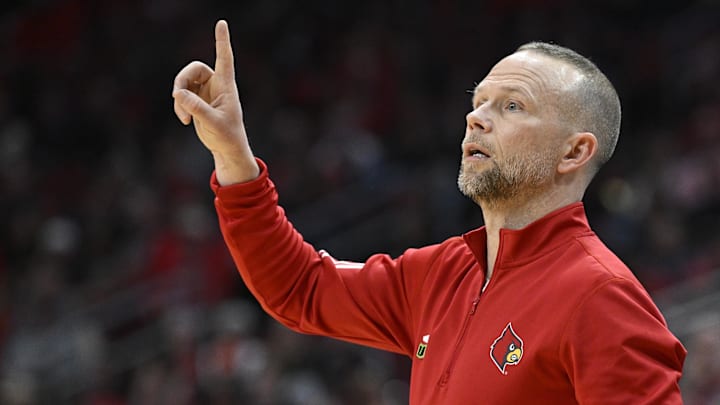 Mar 3, 2026; Louisville, Kentucky, USA;  Louisville Cardinals head coach Pat Kelsey calls out instructions during the first half agains the Syracuse Orange at KFC Yum! Center. Mandatory Credit: Jamie Rhodes-Imagn Images