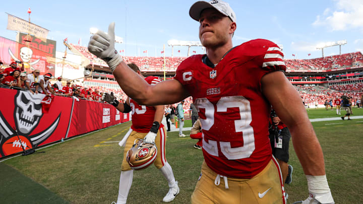 Nov 10, 2024; Tampa, Florida, USA; San Francisco 49ers running back Christian McCaffrey (23) celebrates after beating the Tampa Bay Buccaneers at Raymond James Stadium.