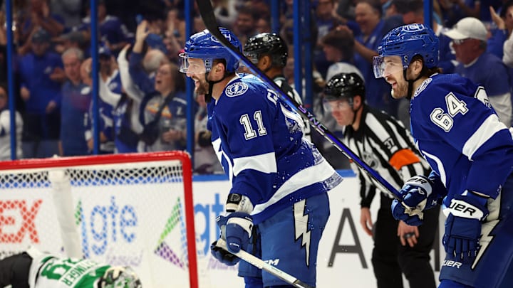 Dec 4, 2023; Tampa, Florida, USA; Tampa Bay Lightning center Luke Glendening (11) is congratulated