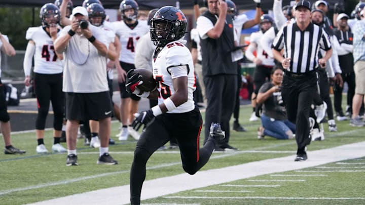 Ensworth’s Justin Hopkins (25) runs into the end zone during a high school football game between Knoxville Catholic and Ensworth at Knoxville Catholic, in Knoxville, Tenn., Friday, Sept. 13, 2024.