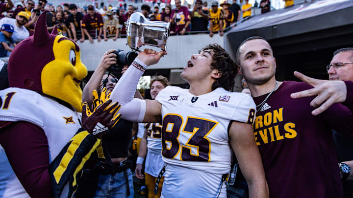 Nov 30, 2024; Tucson, Arizona, USA; Arizona State Sun Devils wide receiver Derek Eusebio (83) drinks out of the Territorial Cup at the end of the game against the Arizona Wildcats at Arizona Stadium. Mandatory Credit: Aryanna Frank-Imagn Images