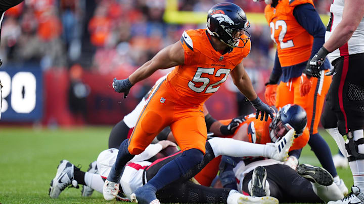 Nov 17, 2024; Denver, Colorado, USA; Denver Broncos linebacker Jonah Elliss (52) reacts after his sack in the second half against the Atlanta Falcons at Empower Field at Mile High. Mandatory Credit: Ron Chenoy-Imagn Images