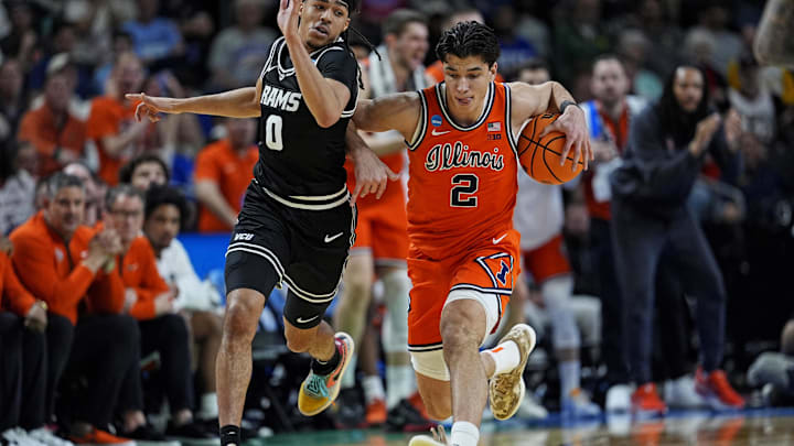 Mar 21, 2026; Greenville, SC, USA; VCU Rams guard Brandon Jennings (0) defends against Illinois Fighting Illini guard Andrej Stojakovic (2) during the second half during a second round game of the men's 2026 NCAA Tournament at Bon Secours Wellness Arena. Mandatory Credit: Jim Dedmon-Imagn Images Mar 21, 2026; Greenville, SC, USA; VCU Rams guard Brandon Jennings (0) defends against Illinois Fighting Illini guard Andrej Stojakovic (2) during the second half during a second round game of the men's 2026 NCAA Tournament at Bon Secours Wellness Arena. Mandatory Credit: Jim Dedmon-Imagn Images