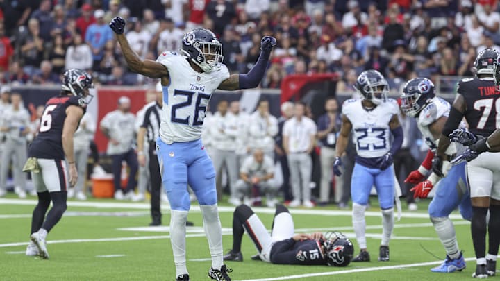 Nov 24, 2024; Houston, Texas, USA; Tennessee Titans cornerback Justin Hardee Sr. (26) reacts after Houston Texans place kicker Ka'imi Fairbairn (15) misses a field goal during the fourth quarter at NRG Stadium. Mandatory Credit: Troy Taormina-Imagn Images