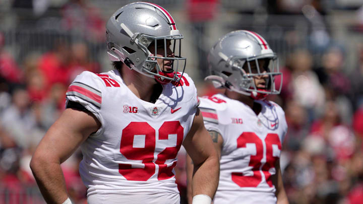 April 13, 2024; Columbus, Ohio, USA; 
Ohio State Buckeyes defensive end Caden Curry (92) and linebacker Gabe Powers (36) compete during the first half of the LifeSports spring football game at Ohio Stadium on Saturday.