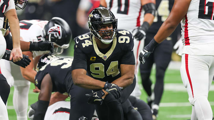 Nov 23, 2025; New Orleans, Louisiana, USA; New Orleans Saints defensive end Cameron Jordan (94) reacts after forcing a fumble against the Atlanta Falcons during the first half at Caesars Superdome. Mandatory Credit: Stephen Lew-Imagn Images