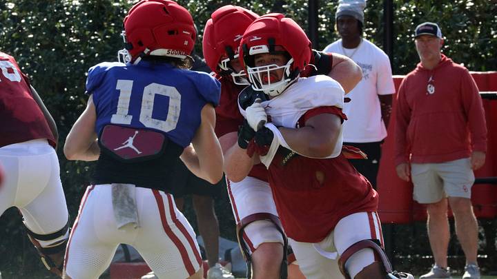 Oklahoma defensive lineman Nigel Smith tracks down John Mateer during one of the Sooners' spring practices. Oklahoma defensive lineman Nigel Smith tracks down John Mateer during one of the Sooners' spring practices.
