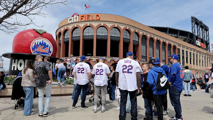 New York City, New York, USA; General view as fans wait in line to take photos with the home run apple at Citi Field before the New York Mets home opener against the Toronto Blue Jays. New York City, New York, USA; General view as fans wait in line to take photos with the home run apple at Citi Field before the New York Mets home opener against the Toronto Blue Jays.