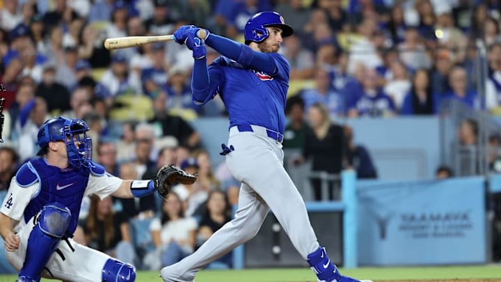 Sep 11, 2024; Los Angeles, California, USA;  Chicago Cubs right fielder Cody Bellinger (24) hits a 3-run home run during the fifth inning against the Los Angeles Dodgers at Dodger Stadium. Mandatory Credit: Kiyoshi Mio-Imagn Images