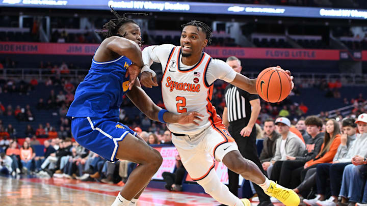 Dec 13, 2025; Syracuse, New York, USA; Syracuse Orange guard JJ Starling (2) drives against Hofstra Pride forward Joshua Decady (4) in the second half at the JMA Wireless Dome. Mandatory Credit: Mark Konezny-Imagn Images Dec 13, 2025; Syracuse, New York, USA; Syracuse Orange guard JJ Starling (2) drives against Hofstra Pride forward Joshua Decady (4) in the second half at the JMA Wireless Dome. Mandatory Credit: Mark Konezny-Imagn Images