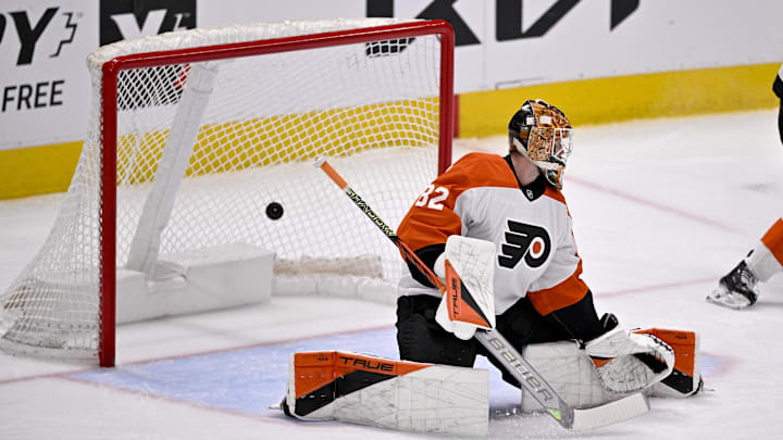 Mar 22, 2025; Dallas, Texas, USA; Philadelphia Flyers goaltender Ivan Fedotov (82) allows a goal to Dallas Stars defenseman Esa Lindell (not pictured) during the first period at the American Airlines Center.