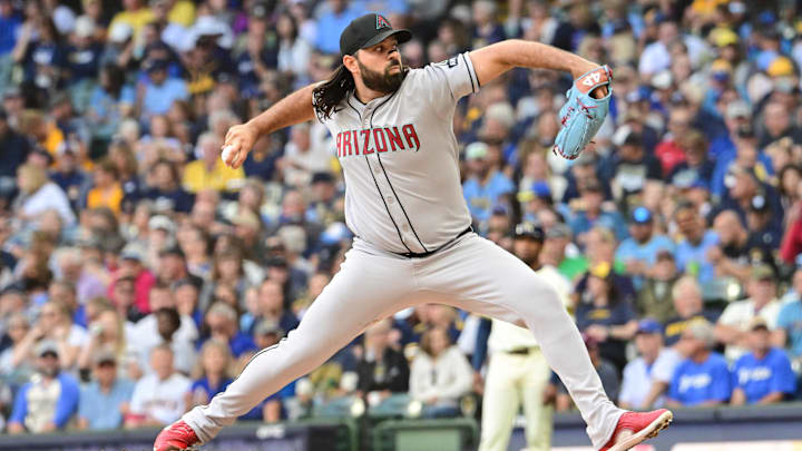 Aug 28, 2025; Milwaukee, Wisconsin, USA; Arizona Diamondbacks starting pitcher Nabil Crismatt (61) throws against the Milwaukee Brewers in the first inning at American Family Field. Mandatory Credit: Benny Sieu-Imagn Images Aug 28, 2025; Milwaukee, Wisconsin, USA; Arizona Diamondbacks starting pitcher Nabil Crismatt (61) throws against the Milwaukee Brewers in the first inning at American Family Field. Mandatory Credit: Benny Sieu-Imagn Images