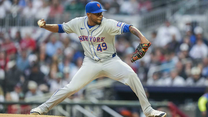 Apr 8, 2024; Cumberland, Georgia, USA; New York Mets starting pitcher Julio Teheran (49) pitches