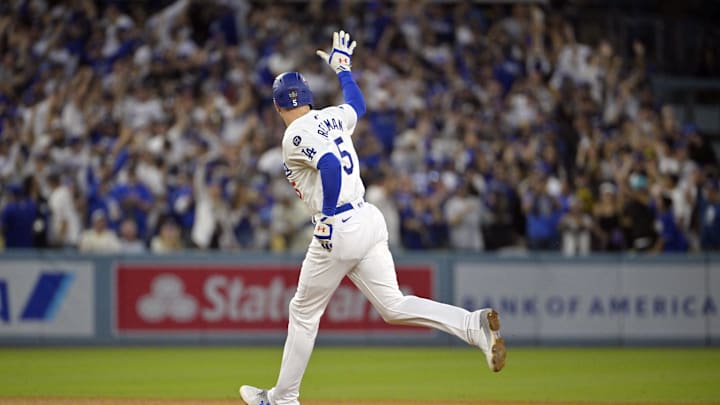 Oct 26, 2024; Los Angeles, California, USA; Los Angeles Dodgers first baseman Freddie Freeman (5) runs after hitting a solo home run in the third inning against the New York Yankees during game two of the 2024 MLB World Series at Dodger Stadium.