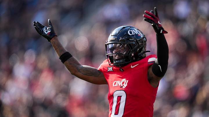 Oct 11, 2025; Cincinnati, Ohio, USA; Cincinnati Bearcats cornerback Matthew McDoom (0) reacts during a stop in play against the UCF Knights in the second half at Nippert Stadium. Mandatory Credit: Aaron Doster-Imagn Images