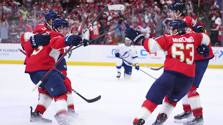 Apr 28, 2025; Sunrise, Florida, USA; Florida Panthers defenseman Seth Jones (3) celebrates with teammates after scoring against the Tampa Bay Lightning during the third period in game four of the first round of the 2025 Stanley Cup Playoffs at Amerant Bank Arena. Mandatory Credit: Rich Storry-Imagn Images