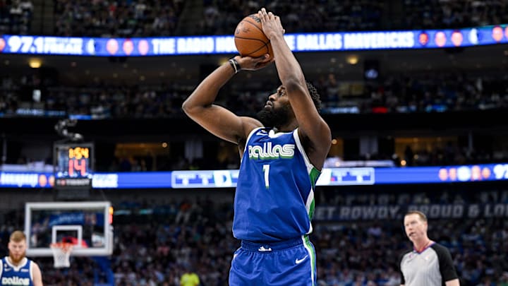 Apr 9, 2023; Dallas, Texas, USA; Dallas Mavericks guard Theo Pinson (1) makes a three point shot