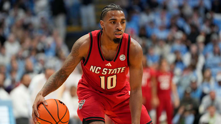 Feb 19, 2025; Chapel Hill, North Carolina, USA; North Carolina State Wolfpack guard Marcus Hill (10) with the ball in the first half at Dean E. Smith Center. Mandatory Credit: Bob Donnan-Imagn Images