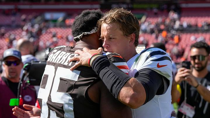 Cleveland Browns defensive end Myles Garrett (95) and Cincinnati Bengals quarterback Joe Burrow (9) hug after the fourth quarter of the NFL Week 1 game between the Cleveland Browns and the Cincinnati Bengals at Huntington Bank Field in Cleveland on Sunday, Sept. 7, 2025. The Bengals begin the season with a 17-16 win over the Browns. Cleveland Browns defensive end Myles Garrett (95) and Cincinnati Bengals quarterback Joe Burrow (9) hug after the fourth quarter of the NFL Week 1 game between the Cleveland Browns and the Cincinnati Bengals at Huntington Bank Field in Cleveland on Sunday, Sept. 7, 2025. The Bengals begin the season with a 17-16 win over the Browns.