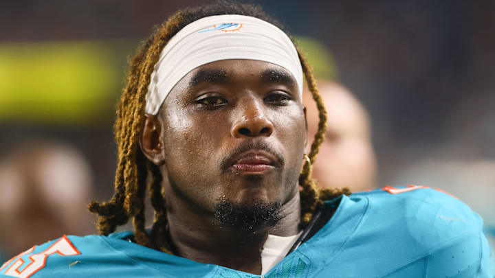 Miami Dolphins center Aaron Brewer (55) looks on after the first half against the Tennessee Titans at Hard Rock Stadium last season.