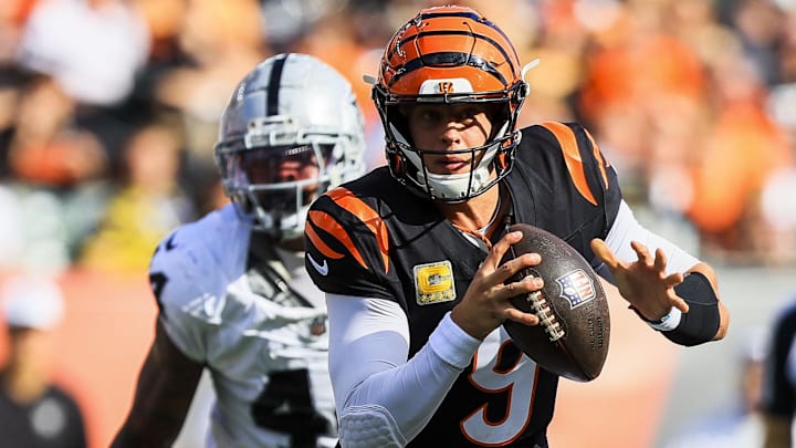 Nov 3, 2024; Cincinnati, Ohio, USA; Cincinnati Bengals quarterback Joe Burrow (9) runs with the ball against the Las Vegas Raiders in the first half at Paycor Stadium. Mandatory Credit: Katie Stratman-Imagn Images Nov 3, 2024; Cincinnati, Ohio, USA; Cincinnati Bengals quarterback Joe Burrow (9) runs with the ball against the Las Vegas Raiders in the first half at Paycor Stadium. Mandatory Credit: Katie Stratman-Imagn Images