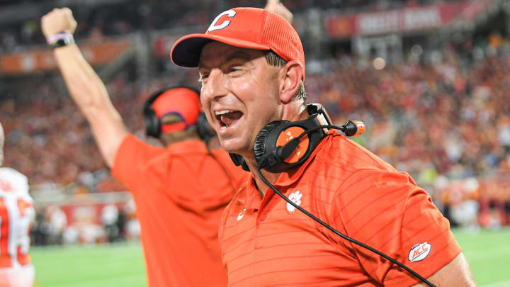 Clemson head coach Dabo Swinney celebrates after corner back Mario Goodrich (31) scored a touchdown after an interception during the third quarter of the 2021 Cheez-It Bowl at Camping World Stadium in Orlando, Florida Wednesday, December 29, 2021.

Ncaa Football Cheez It Bowl Iowa State Vs Clemson