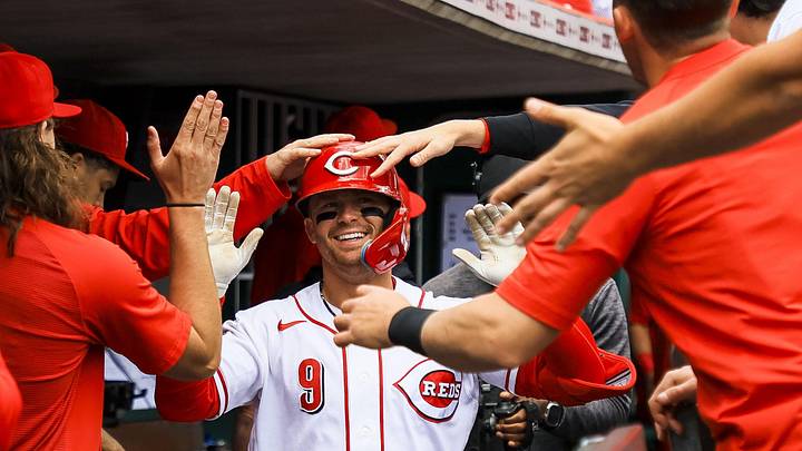 May 14, 2026; Cincinnati, Ohio, USA; Cincinnati Reds second baseman Matt McLain (9) high fives teammates after hitting a two-run home run in the second inning against the Washington Nationals at Great American Ball Park. Mandatory Credit: Katie Stratman-Imagn Images