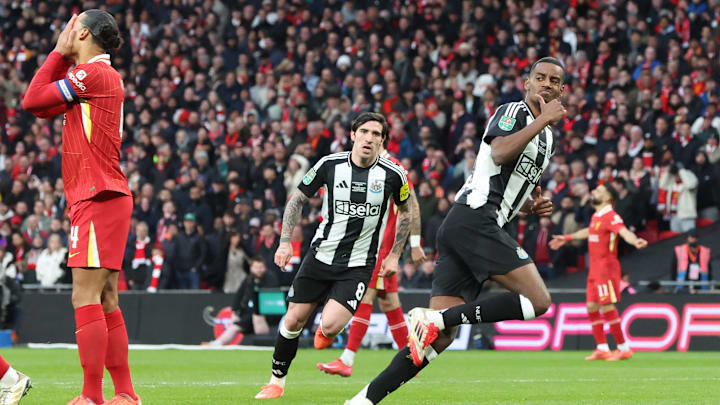 Virgil van Dijk (left) can't look on as Alexander Isak goes to celebrate Newcastle United's second goal of the final.