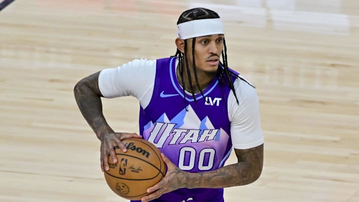 Nov 23, 2024; Salt Lake City, Utah, USA; Utah Jazz guard Jordan Clarkson (00) dribbles the ball down court against the New York Knicks during the second half at the Delta Center. Mandatory Credit: Christopher Creveling-Imagn Images