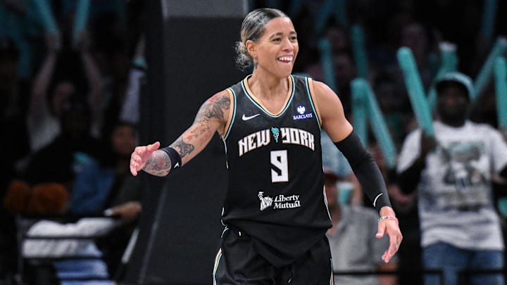 Jun 1, 2025; Brooklyn, New York, USA; New York Liberty guard Natasha Cloud (9) reacts after making a three point basket against the Connecticut Sun during the second half at Barclays Center. Mandatory Credit: John Jones-Imagn Images Jun 1, 2025; Brooklyn, New York, USA; New York Liberty guard Natasha Cloud (9) reacts after making a three point basket against the Connecticut Sun during the second half at Barclays Center. Mandatory Credit: John Jones-Imagn Images
