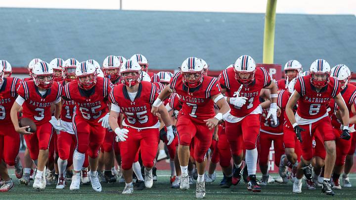 The Portsmouth varsity football team during its 2025 season opener.