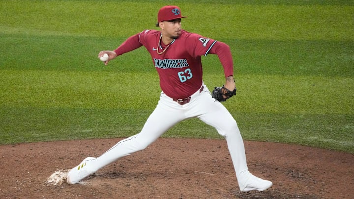Arizona Diamondbacks pitcher Justin Martinez (63) throws against the Los Angeles Dodgers during the